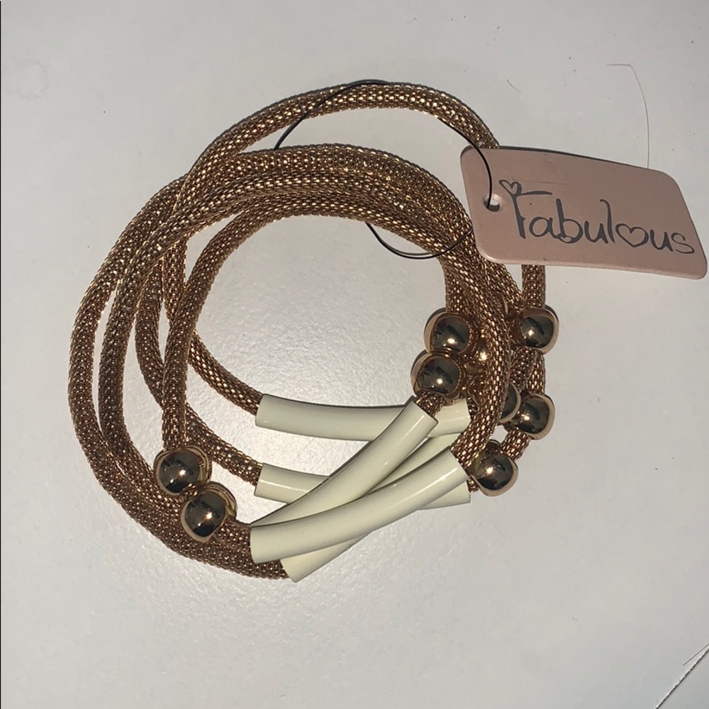 Five gold matching bracelets